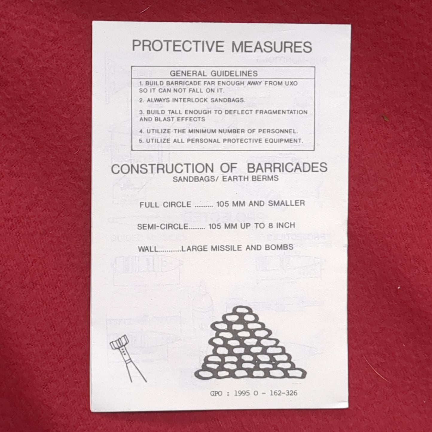 BOOK UNEXPLODED ORNANCE (UXO) PROCERDURES UXO MARKER WHITE BOMB ON A RED BACKGROUND (box10)