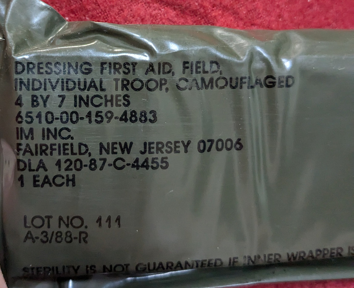 US Military Camouflaged Field First Aid Dressing Pouch, 2 Unopened 4x7" Bandages (CB01-25APR51)
