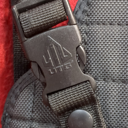UTG right hand holster black used (31cr- ca6-enu56)