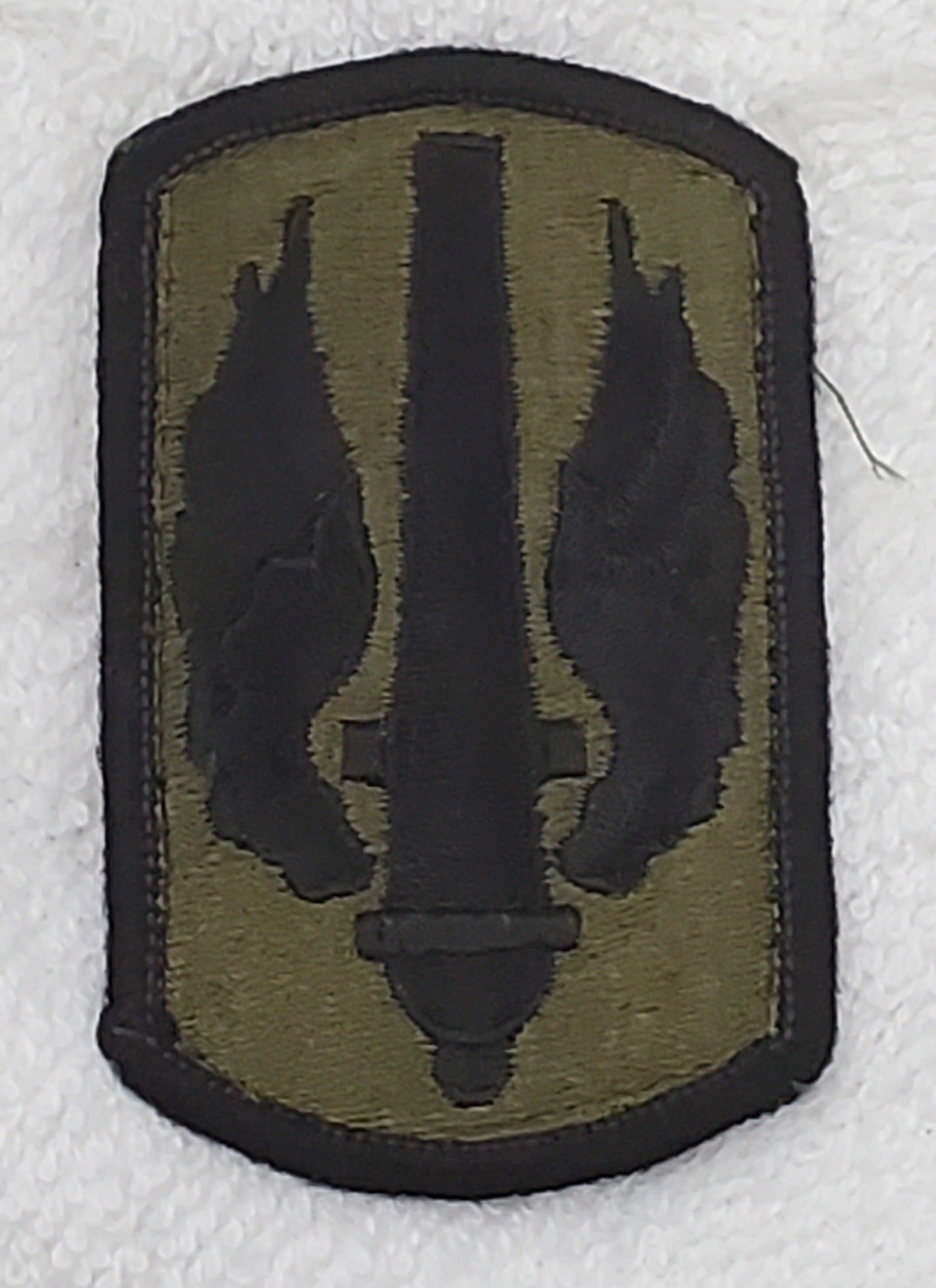 US Army 18th Field Artillery Brigade Subdued Sew On Patch OD BLACK (bu09-18fa)