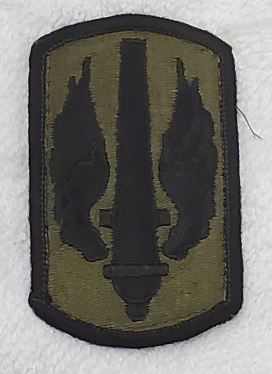 US Army 18th Field Artillery Brigade Subdued Sew On Patch OD BLACK (bu09-18fa)