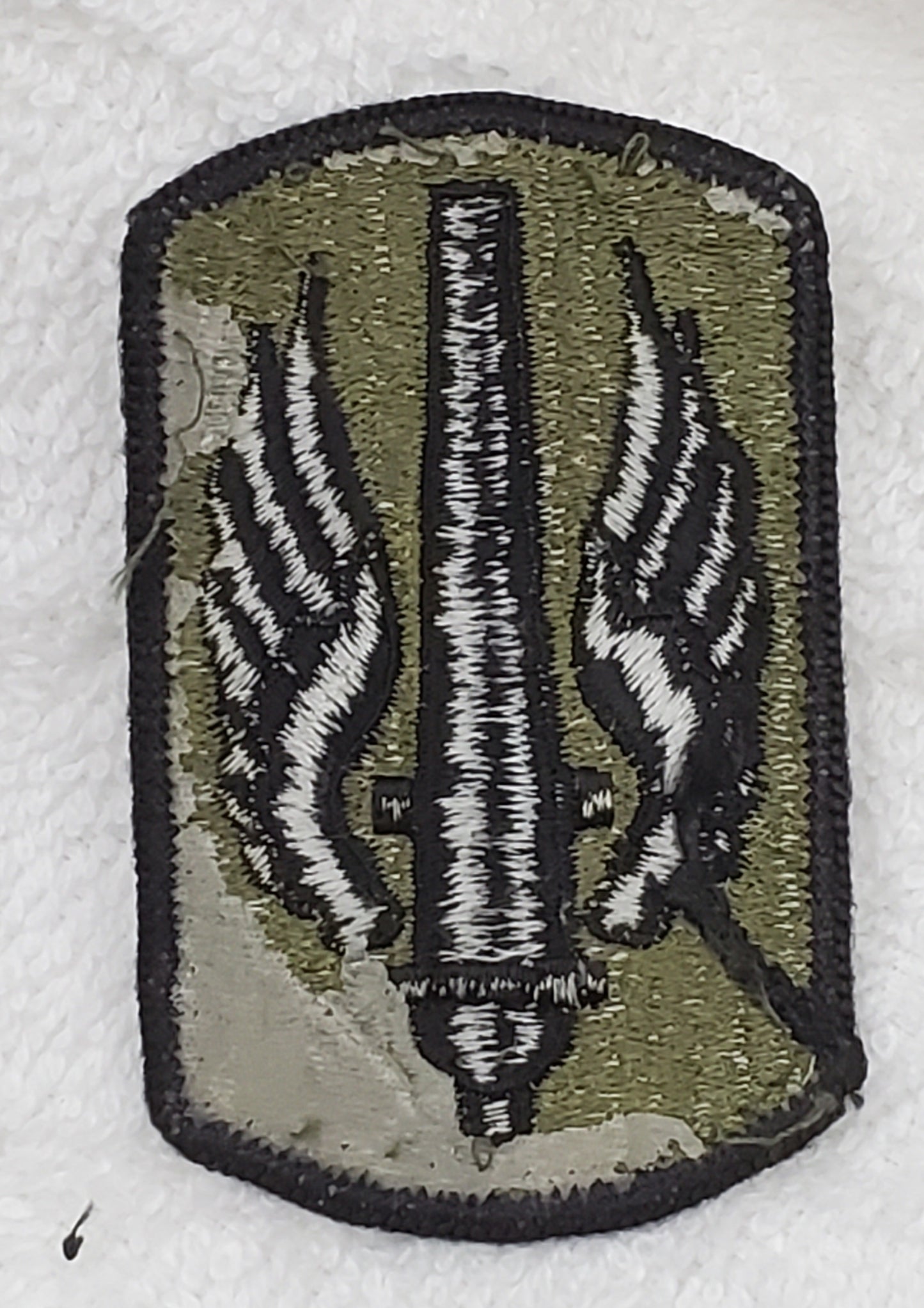 US Army 18th Field Artillery Brigade Subdued Sew On Patch OD BLACK (bu09-18fa)