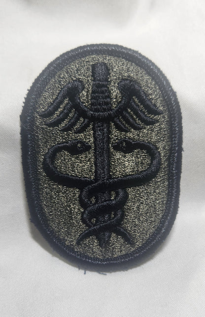 US Army Medical Health Services Command Patch Sew on Patch Subdued OD Black (WSA08-MHS)