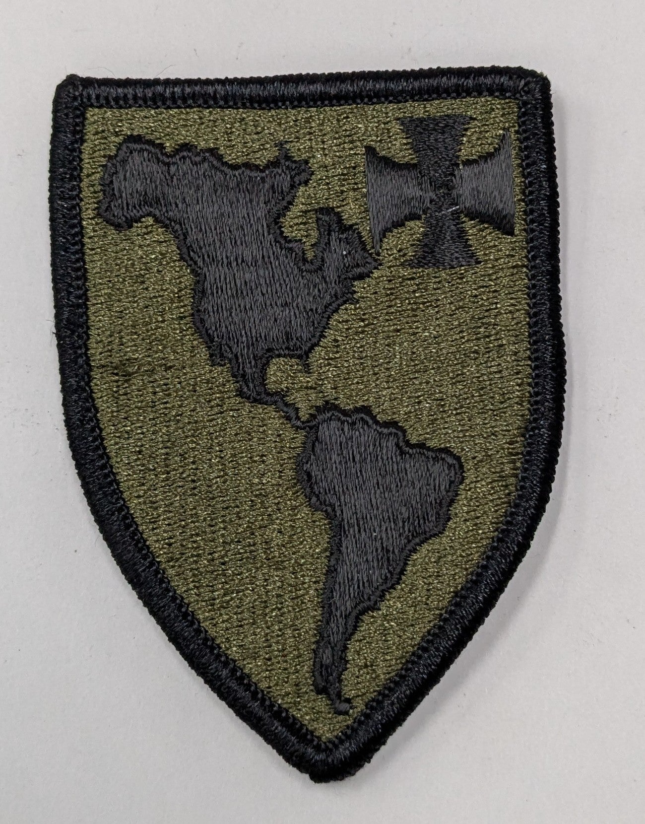 US Army Western Hemisphere Institute for Security Cooperation Patch Velcro Subdued Black OD (bu09-WHINSEC)