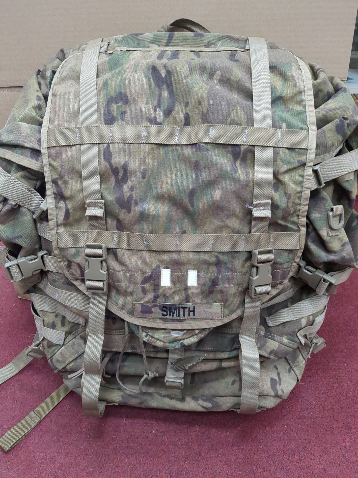 Smith Caleb MAIL-IN - v.12 "Ranger Ready" OCP Large Molle II Ruck w/ The Gibson Configuration w/ Name Tape & Cat Eyes (V12 2026-07)